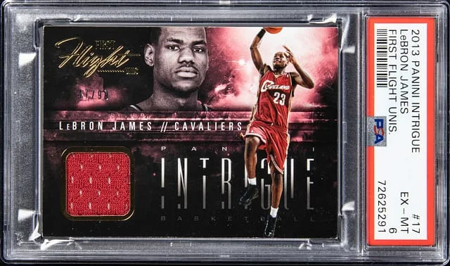 2013-14 Panini LeBron James Intrigue First Flight Unis #17 card image