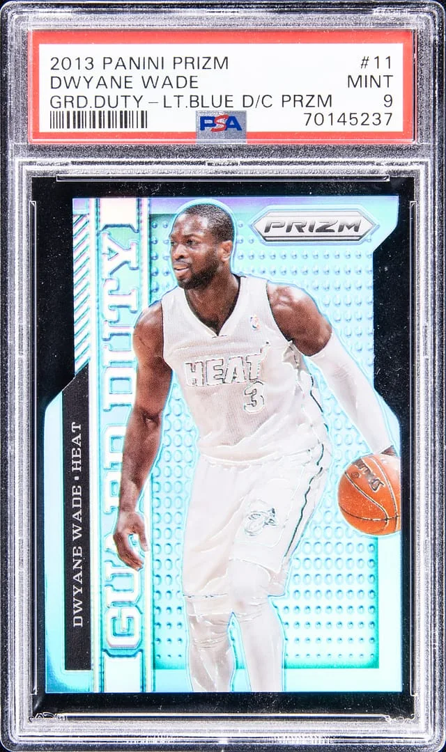 2013-14 Panini Prizm Dwyane Wade Guard Duty Light Blue Die-Cut #11 card image