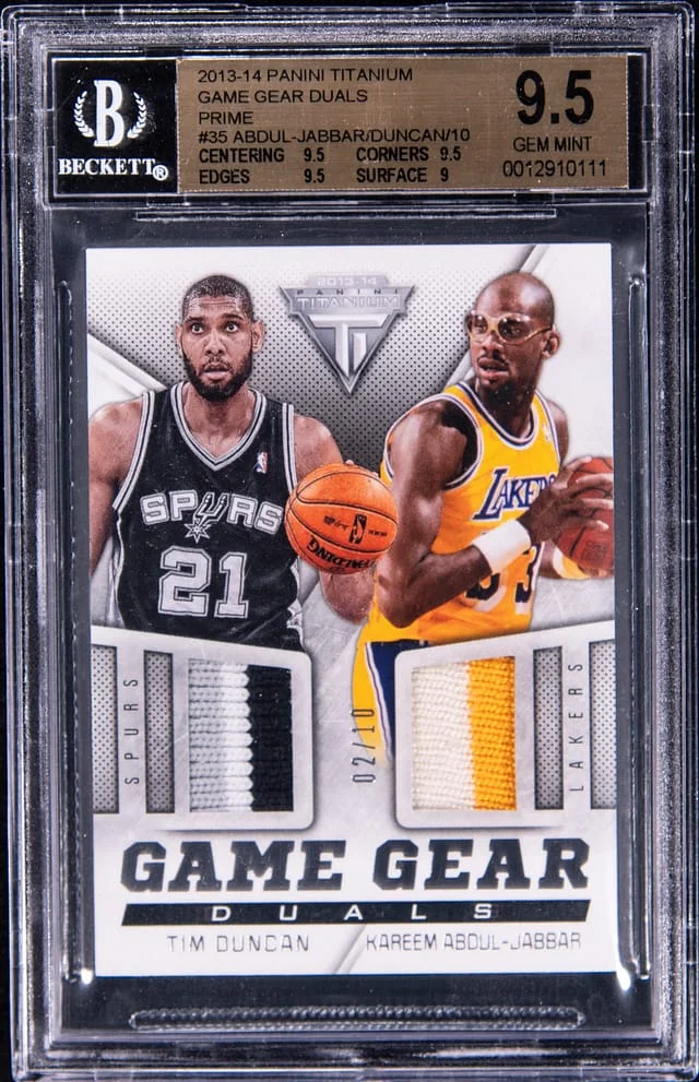 2013-14 Panini Tim Duncan/Kareem Abdul-Jabbar Titanium Game Gear Duals Prime #35 card image