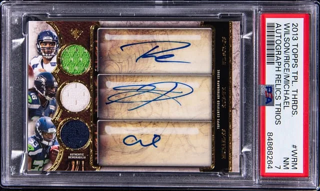 2013 Topps Triple Threads Russell Wilson/Sidney Rice/Christine Michael Multi-Signed Autograph Relics Trios #WRM card image