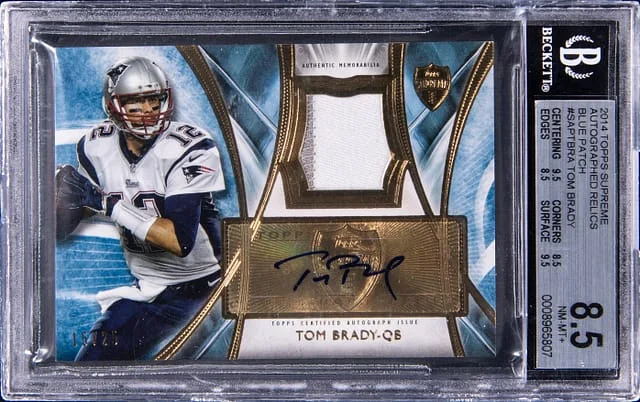 2014 Topps Tom Brady Supreme Autographed Relics Blue Patch #SAPTBRA card image