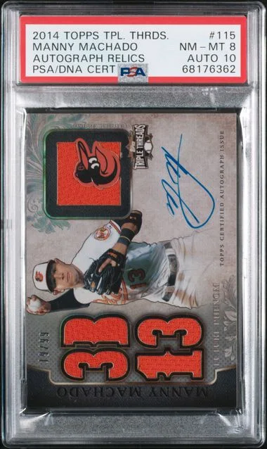 2014 Topps Triple Threads Manny Machado Autograph Relics #115 card image