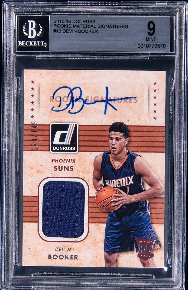 2015-16 Panini Donruss Devin Booker Material Signatures #13 card image