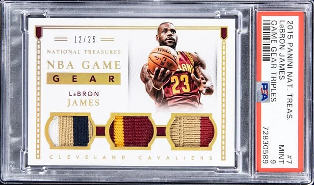 2015-16 Panini National Treasures LeBron James Game Gear Triples #7 card image