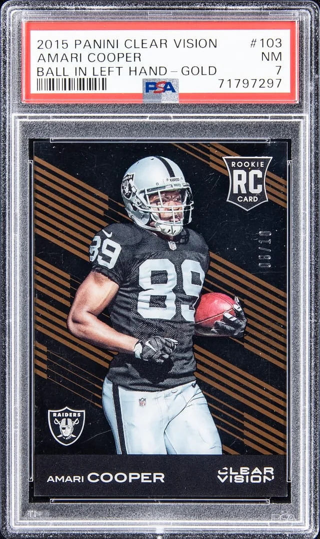 2015 Panini Amari Cooper Clear Vision Ball In Left Hand Gold #103 card image