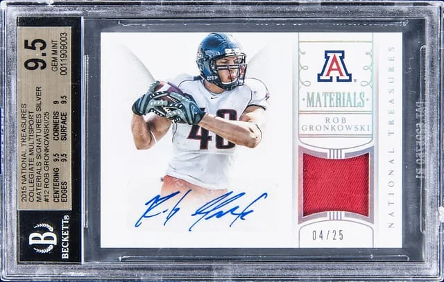 2015 Panini National Treasures Rob Gronkowski Collegiate Multisport Materials Signatures-Silver #12 card image