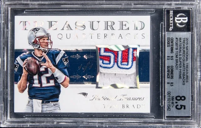 2015 Panini National Treasures Tom Brady Treasured Quarterbacks Materials Super Prime #TQB-TB card image