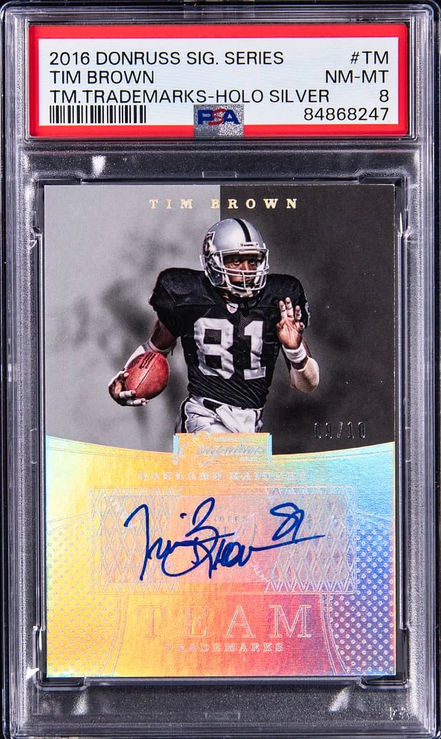 2016 Donruss Tim Brown Signature Series Team Trademarks Holo Silver #TM card image