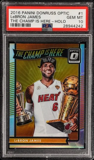 2016 Panini Donruss Optic LeBron James The Champ Is Here Holo #1 card image