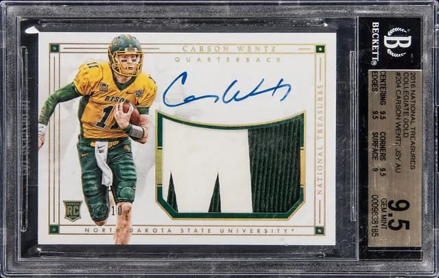 2016 Panini National Treasures Carson Wentz Collegiate Gold Jersey Autograph #204 card image