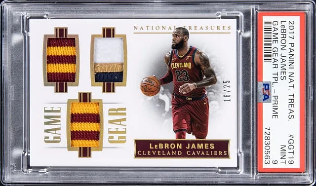 2017-18 Panini National Treasures LeBron James Game Gear Triples Prime #GGT-19 card image
