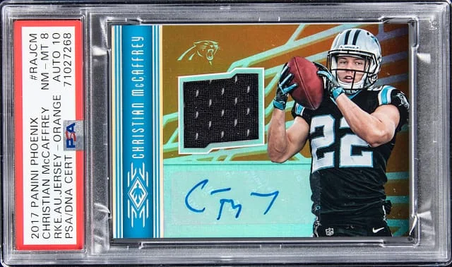 2017 Panini Christian McCaffrey Phoenix Autograph Jersey Orange #RAJ-CM card image