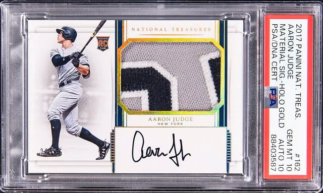 2017 Panini National Treasures Aaron Judge Material Signatures Holo Gold #152 card image
