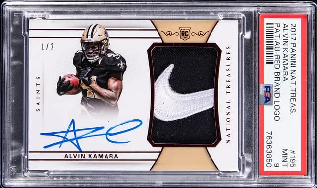 2017 Panini National Treasures Alvin Kamara Patch Autograph Red Brand Logo #195 card image
