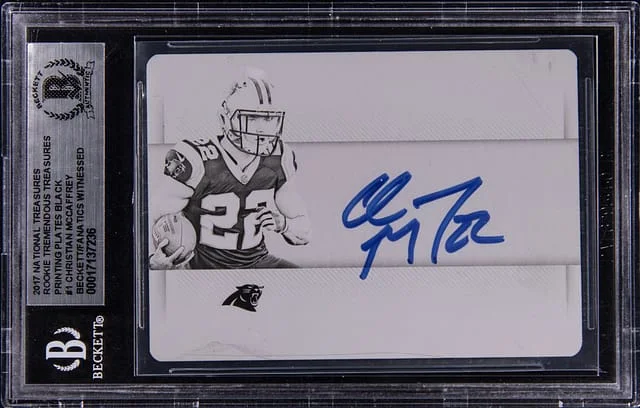 2017 Panini National Treasures Christian McCaffrey Tremendous Treasures Printing Plates Black #1 card image