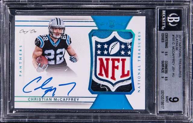2017 Panini National Treasures Christian McCaffrey Patch Autograph (RPA) Platinum #181 card image