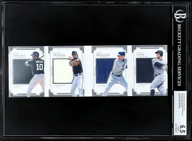 2017 Panini National Treasures Cody Bellinger/Aaron Judge/Yoan Moncada/Dansby Swanson Quad Player Materials Booklet #QPMB-1 card image