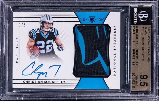 2017 Panini National Treasures Cristian McCaffrey Jersey Autograph Black #181 card image