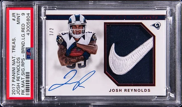 2017 Panini National Treasures Josh Reynolds Material Signatures Brand Logo Red #RMS-JR card image