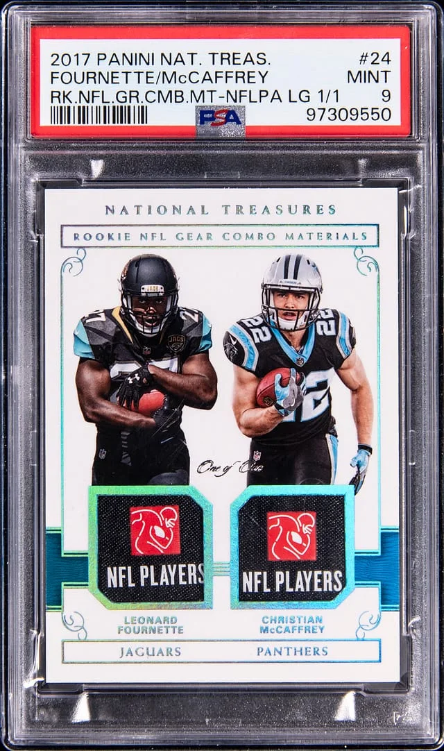2017 Panini National Treasures Leonard Fournette/Christian McCafrey NFL Combo Materials #24 card image