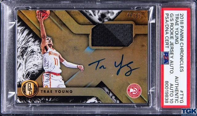 2018-19 Panini Chronicles Trae Young Gold Standard Jersey Autograph #GS-TYG card image