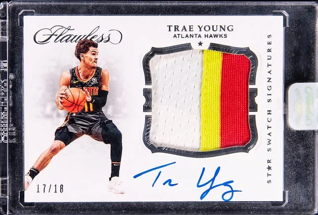 2018-19 Panini Flawless Trae Young Star Swatch Signatures #SS-TYG card image