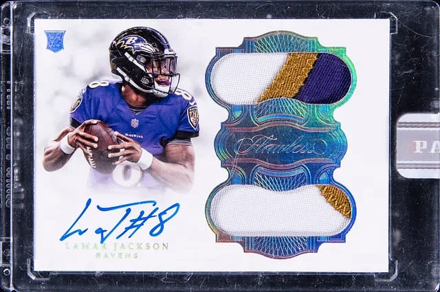 2018 Panini Flawless Lamar Jackson Dual Patch Autograph Ruby '22 Black Box #RCD-LJ card image