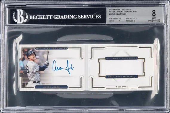 2018 Panini National Treasures Aaron Judge Signature Material Booklet #13 card image