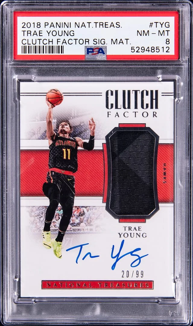 2018 Panini National Treasures Trae Young Clutch Factor Signature Material #TYG card image