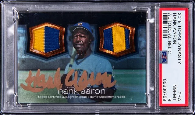 2018 Topps Dynasty Hank Aaron Dual Relic Autograph #ADRC-HA card image