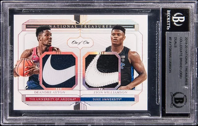 2019-20 Panini National Treasures Deandre Ayton/Zion Williamson Dual Collegiate Brand Logo Duals #7 card image