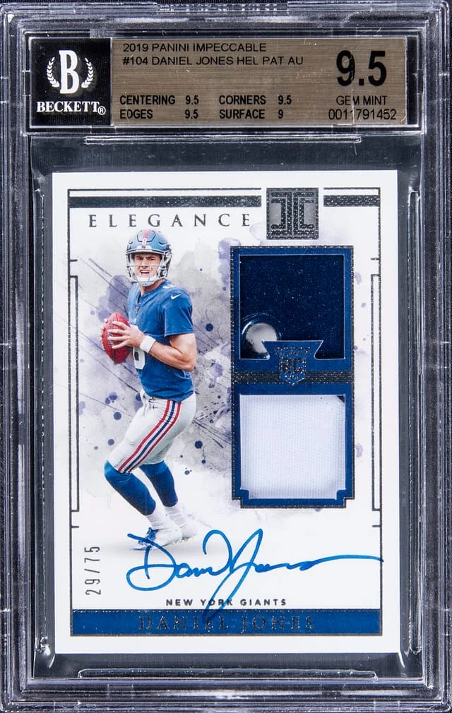 2019 Panini Impeccable Daniel Jones Helmet Patch Autograph Cleat #104 card image