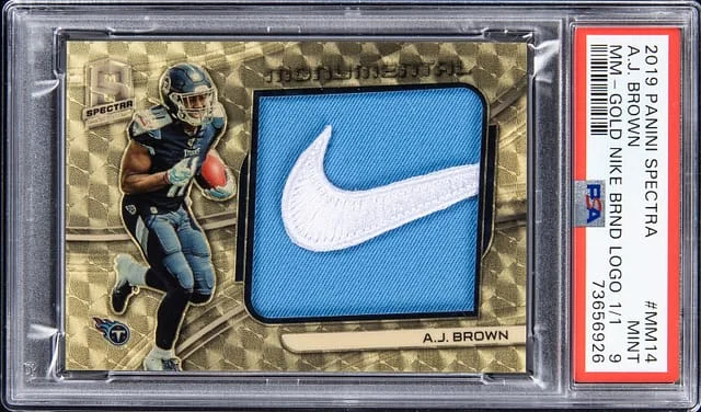 2019 Panini Spectra A.J. Brown Monumental Memorabilia Gold Vinyl Nike Brand Logo #MM-14 card image