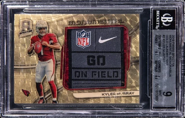 2019 Panini Spectra Monumental Memorabilia Gold Laundry #no-number card image
