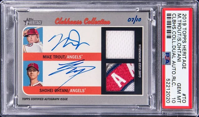 2019 Topps Heritage Mike Trout/Shohei Ohtani Clubhouse Collection Dual Autograph Relics #TO card image
