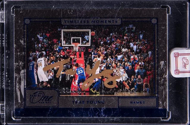 2020-21 Panini One and One Trae Young Timeless Moments Blue #TML-TRY card image