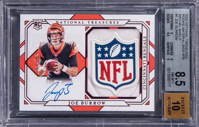 2020 National Treasures Joe Burrow Material Signatures RPS Red NFL Shield #RMS-JB card image
