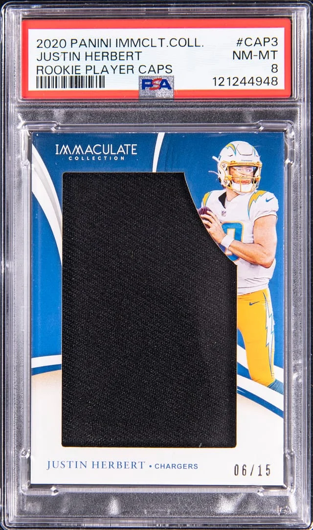 2020 Panini Immaculate Collection Justin Herbert Player Caps #CAP3 card image