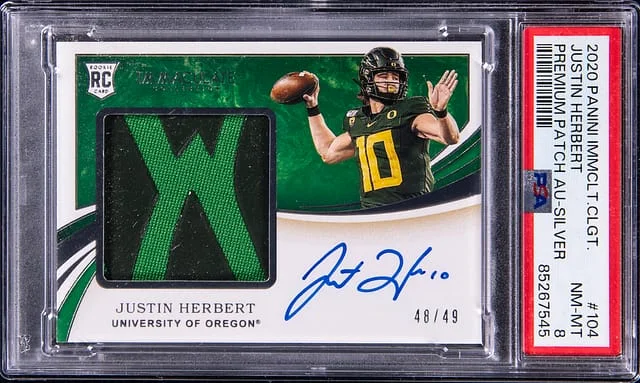 2020 Panini Immaculate Justin Herbert Collegiate Premium Patch Autograph Silver #104 card image