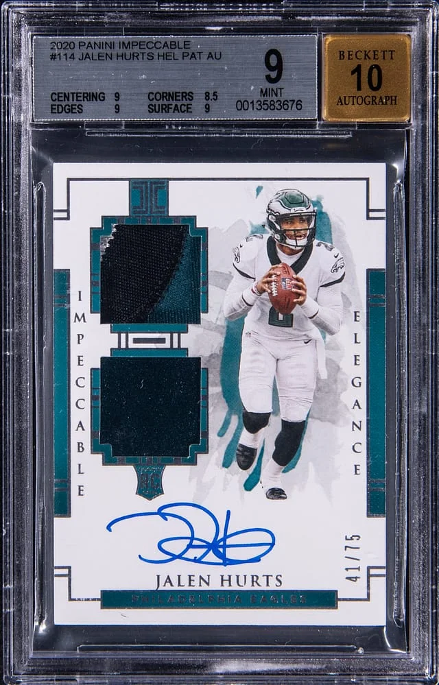 2020 Panini Impeccable Jalen Hurts Elegance Rookies Helmet and Patch Autograph #114 card image