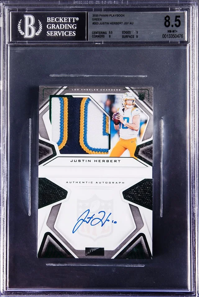 2020 Panini Justin Herbert Playbook Football Playbook Material Green Autograph #203 card image