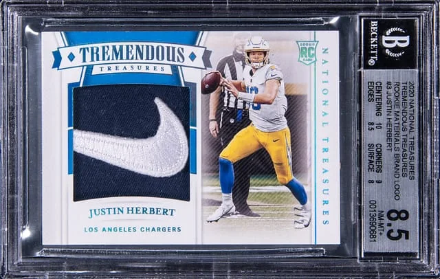 2020 Panini National Treasures Justin Herbert Crossover Patch Autograph (RPA) Holo Gold #3 card image