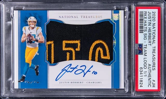 2020 Panini National Treasures Justin Herbert Hats Signatures Team Logo #RHS-JH card image