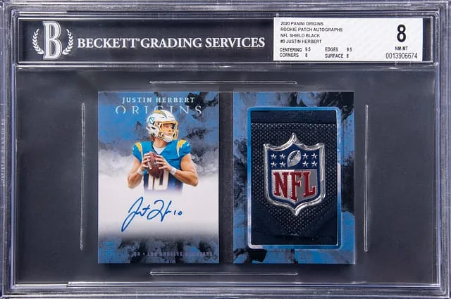 2020 Panini Origins Justin Herbert Patch Autographs NFL Shield Black #JH card image