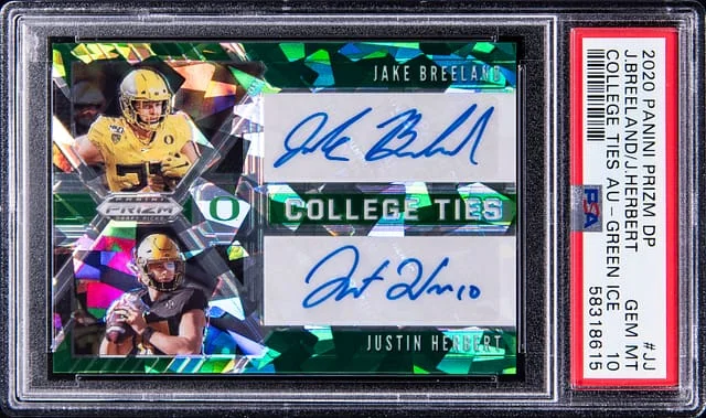 2020 Panini Prizm Draft Picks Justin Herbert/Jake Breeland Dual College Ties Autograph Green Ice #CTA-JJ card image