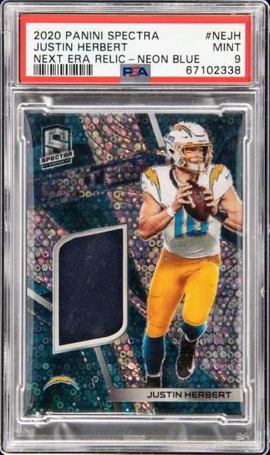 2020 Panini Spectra Justin Herbert Next Era Relics Neon Blue #NE-JH card image