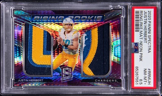 2020 Panini Spectra Justin Herbert Rising Neon Pink #RRMJH card image