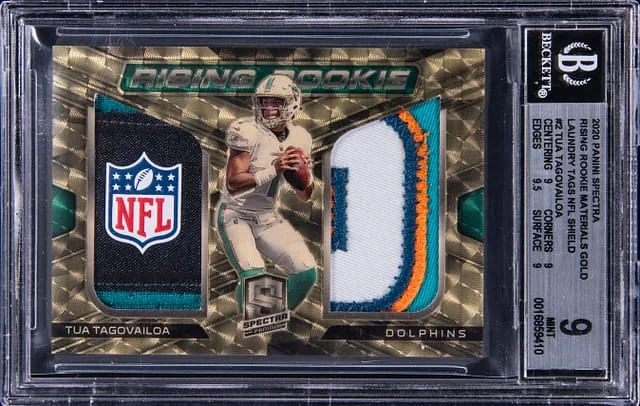 2020 Panini Spectra Tua Tagovailoa Dual Rising Materials Gold Laundry Tags NFL Shield #RRM-TT card image