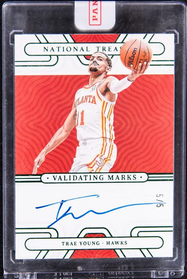 2021-22 Panini National Treasures Trae Young Validating Marks Emerald #VM-TYG card image