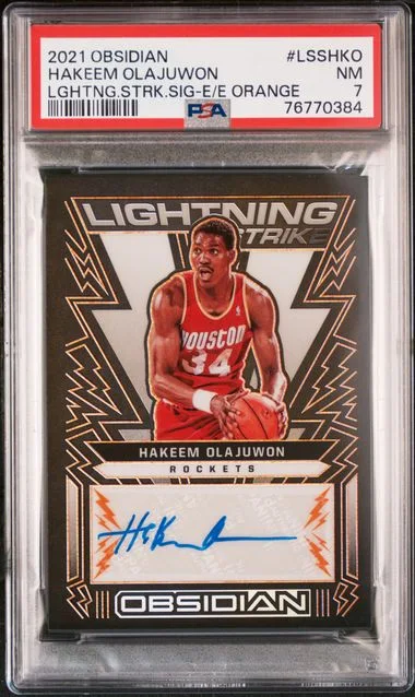 2021-22 Panini Obsidian Hakeem Olajuwon Lightning Strike Signatures Electric Etch Orange #LSS-HKO card image